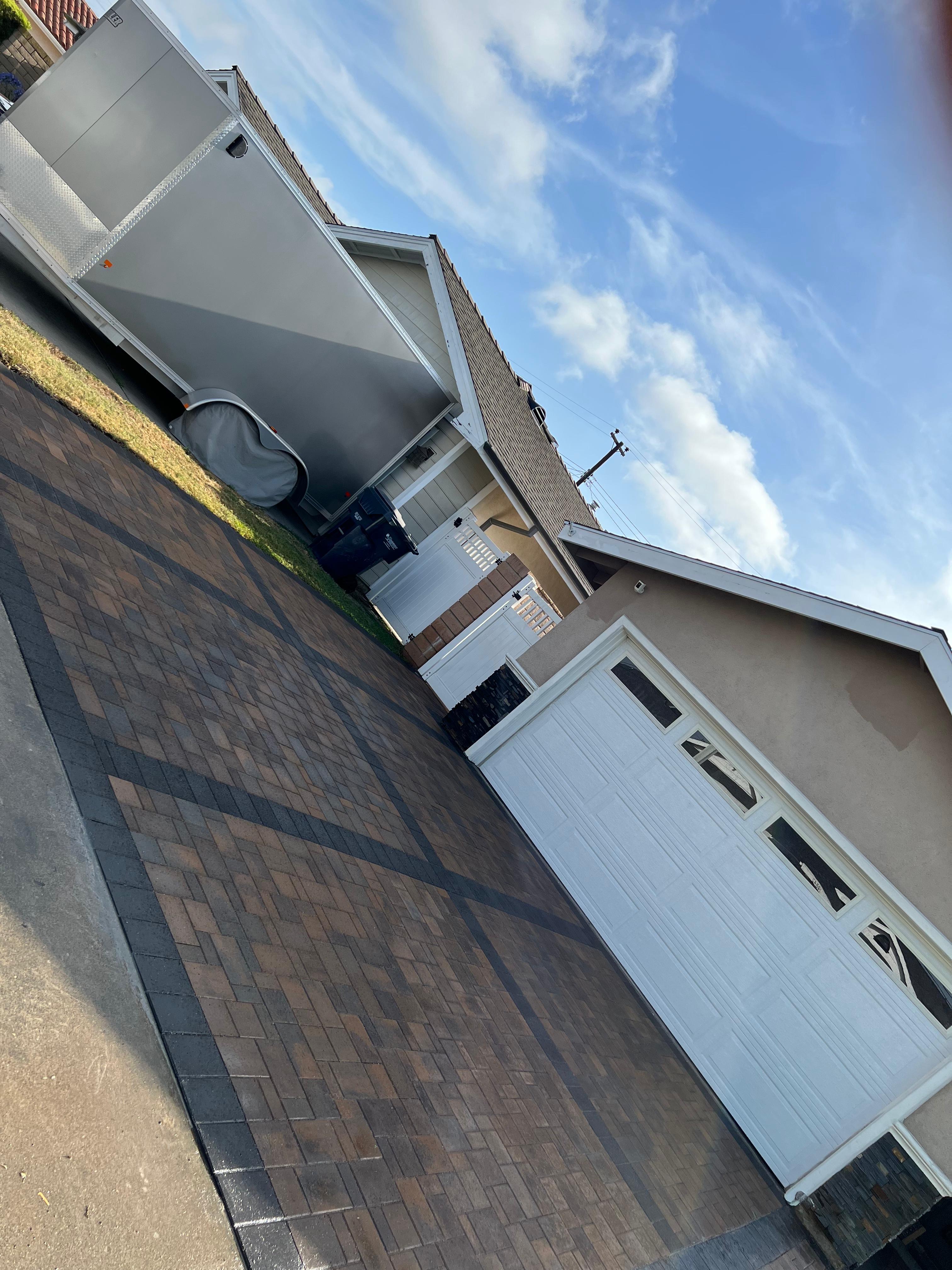 Paver driveway with dark border accent pattern